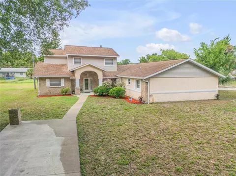 299 W Hickory Ave, Oak Hill, FL 32759