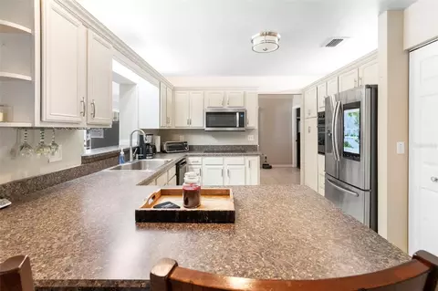 Kitchen - 3080 Ragis Rd, Edgewater, FL 32132 photo 4 of 8
