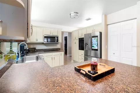 Kitchen - 3080 Ragis Rd, Edgewater, FL 32132 photo 5 of 8
