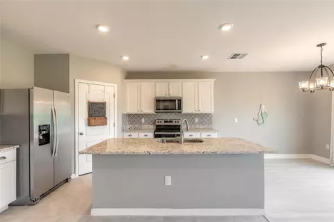 Kitchen - 319 Sunset View Dr, Edgewater, FL 32141 photo 4 of 5