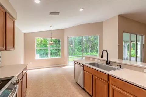 Kitchen - 604 Coral Trace Blvd, Edgewater, FL 32132 photo 5 of 6