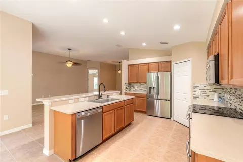 Kitchen - 604 Coral Trace Blvd, Edgewater, FL 32132 photo 4 of 6