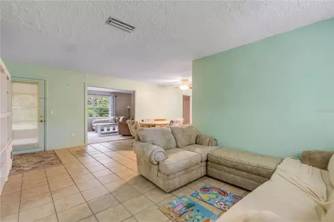 Living - 1430 Umbrella Tree Dr, Edgewater, FL 32132 photo 1 of 4