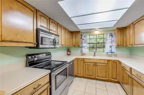 Kitchen - 1430 Umbrella Tree Dr, Edgewater, FL 32132 photo 1 of 3