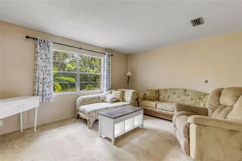 Living - 1430 Umbrella Tree Dr, Edgewater, FL 32132 photo 3 of 4