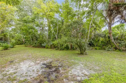 Exterior - 1430 Umbrella Tree Dr, Edgewater, FL 32132 photo 6 of 7