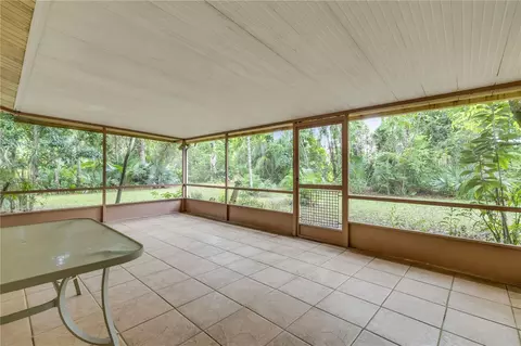 Exterior - 1430 Umbrella Tree Dr, Edgewater, FL 32132 photo 2 of 7