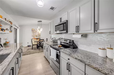 Kitchen - 3426 Yule Tree Dr, Edgewater, FL 32141 photo 4 of 7