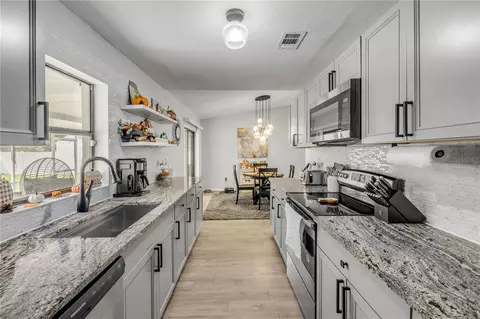 Kitchen - 3426 Yule Tree Dr, Edgewater, FL 32141 photo 5 of 7