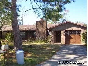 3116 Pine Tree Dr, Edgewater, FL 32141 photo 1