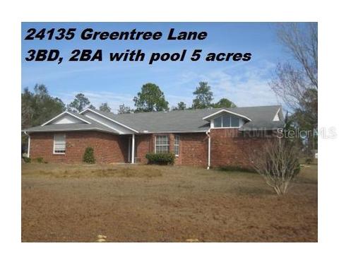 24135 Greentree Ln, Eustis, FL 32736 photo 1