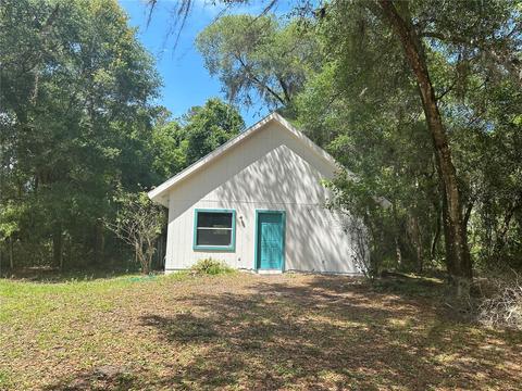 671 Tedder Lake Rd, De Leon Springs, FL 32130