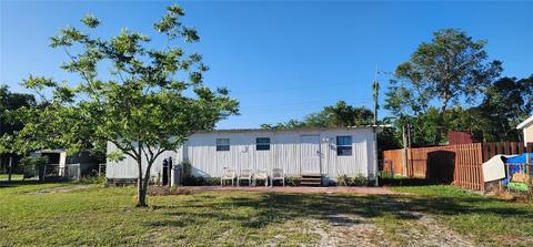 129 N 1st St, Oak Hill, FL 32759