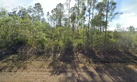 819 Calliandra Dr, Indian Lake Estates, FL 33855