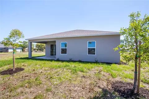 Exterior - 25880 Prada Dr, Punta Gorda, FL 33955 photo 4 of 8