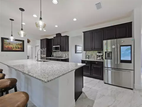Kitchen - 5264 Obsidian Gate Dr, Mount Dora, FL 32757 photo 3 of 6