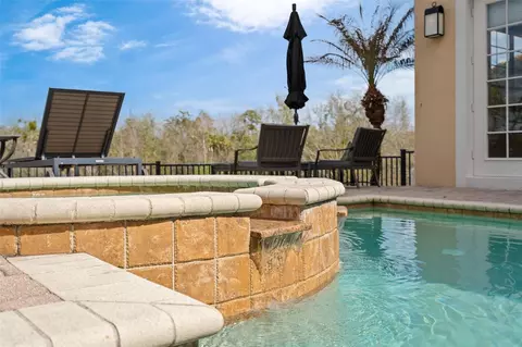 Exterior - 490 Muirfield Loop, Reunion, FL 34747 photo 9 of 10