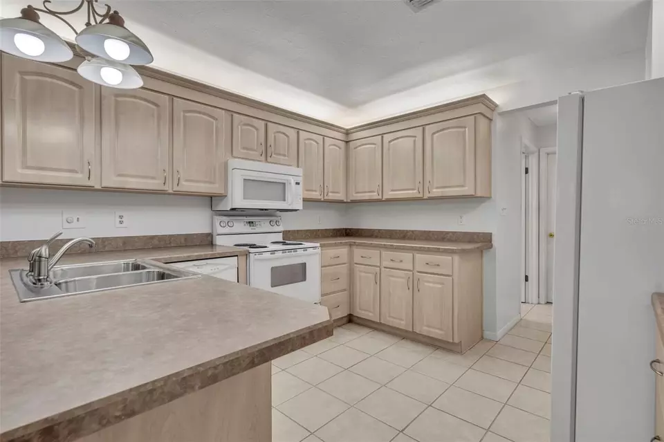 Kitchen - 1238 Palmetto Rd, Eustis, FL 32726 photo 3 of 7