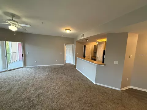 Living - 2015 Erving Cir #307, Ocoee, FL 34761 photo 4 of 7