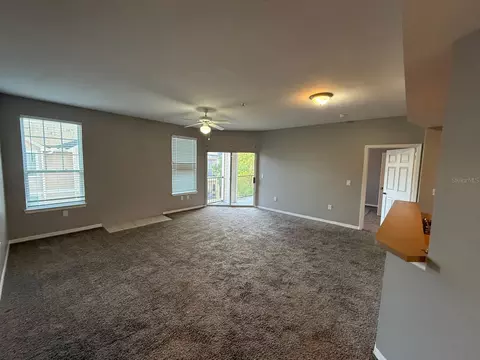 Living - 2015 Erving Cir #307, Ocoee, FL 34761 photo 5 of 7