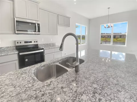 Kitchen - 4487 Sagefield Dr, Harmony, FL 34773 photo 2 of 2