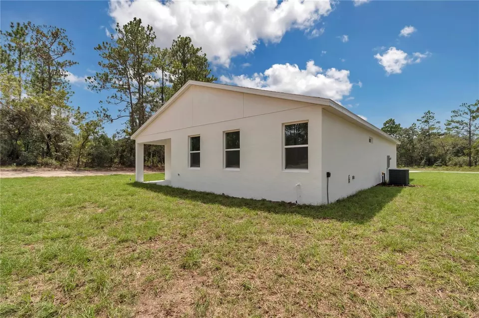 Exterior - 3207 SW Ivy Pl, Dunnellon, FL 34431 photo 9 of 11