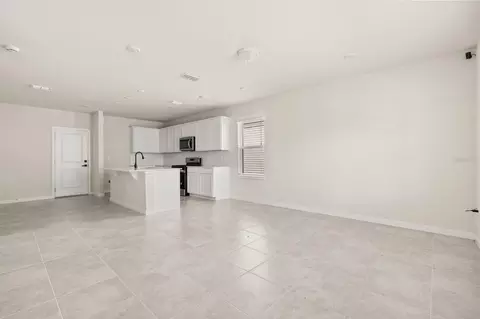 Living - 4066 Feather Tree Dr, Apopka, FL 32712 photo 1 of 2