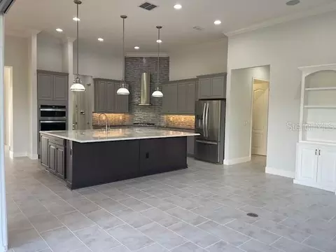 Kitchen - 2600 Meadowedge Loop, Saint Cloud, FL 34772 photo 5 of 13