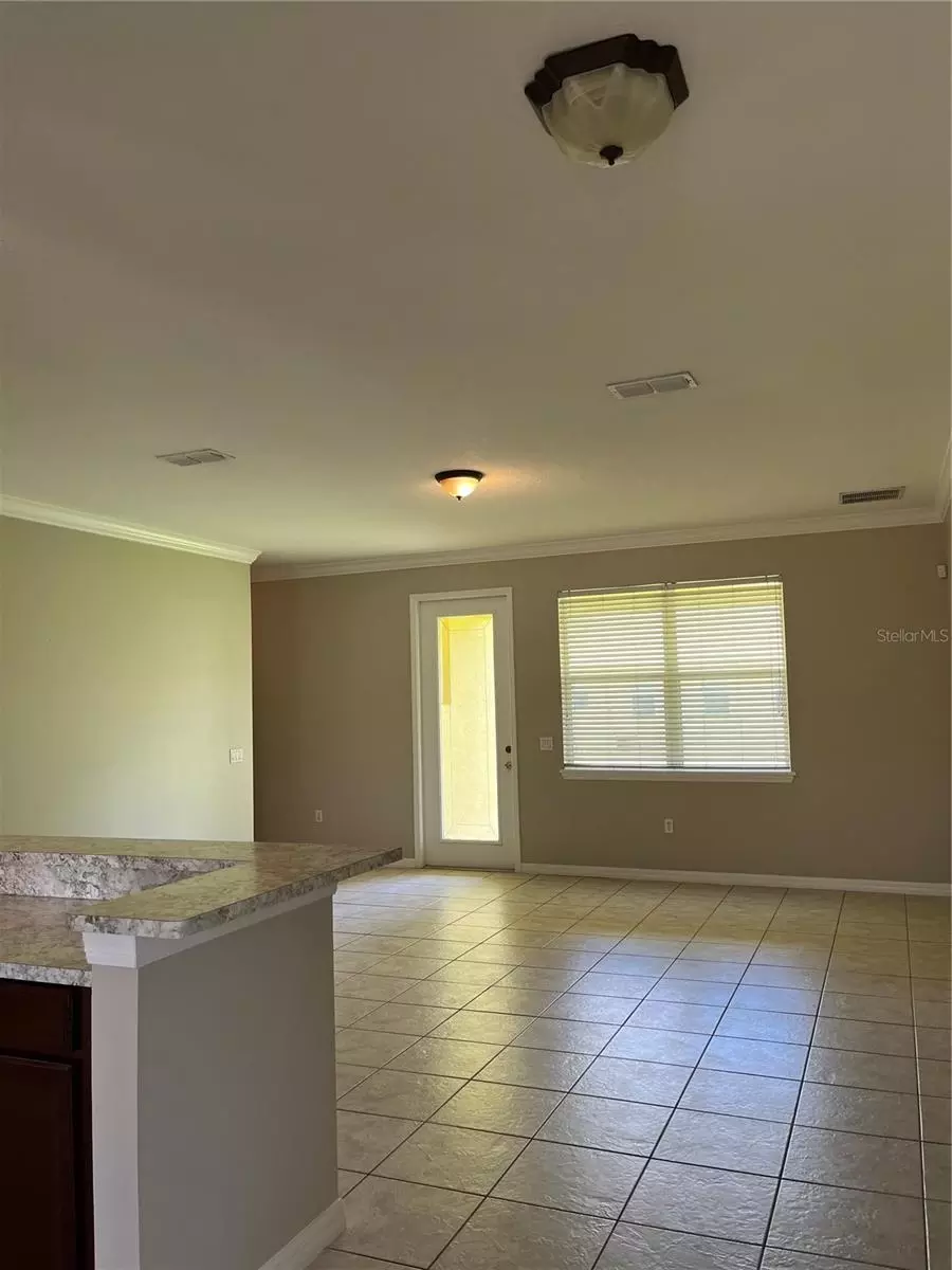 Living - 3031 Palermo Rose Way, Kissimmee, FL 34746 photo 2 of 3