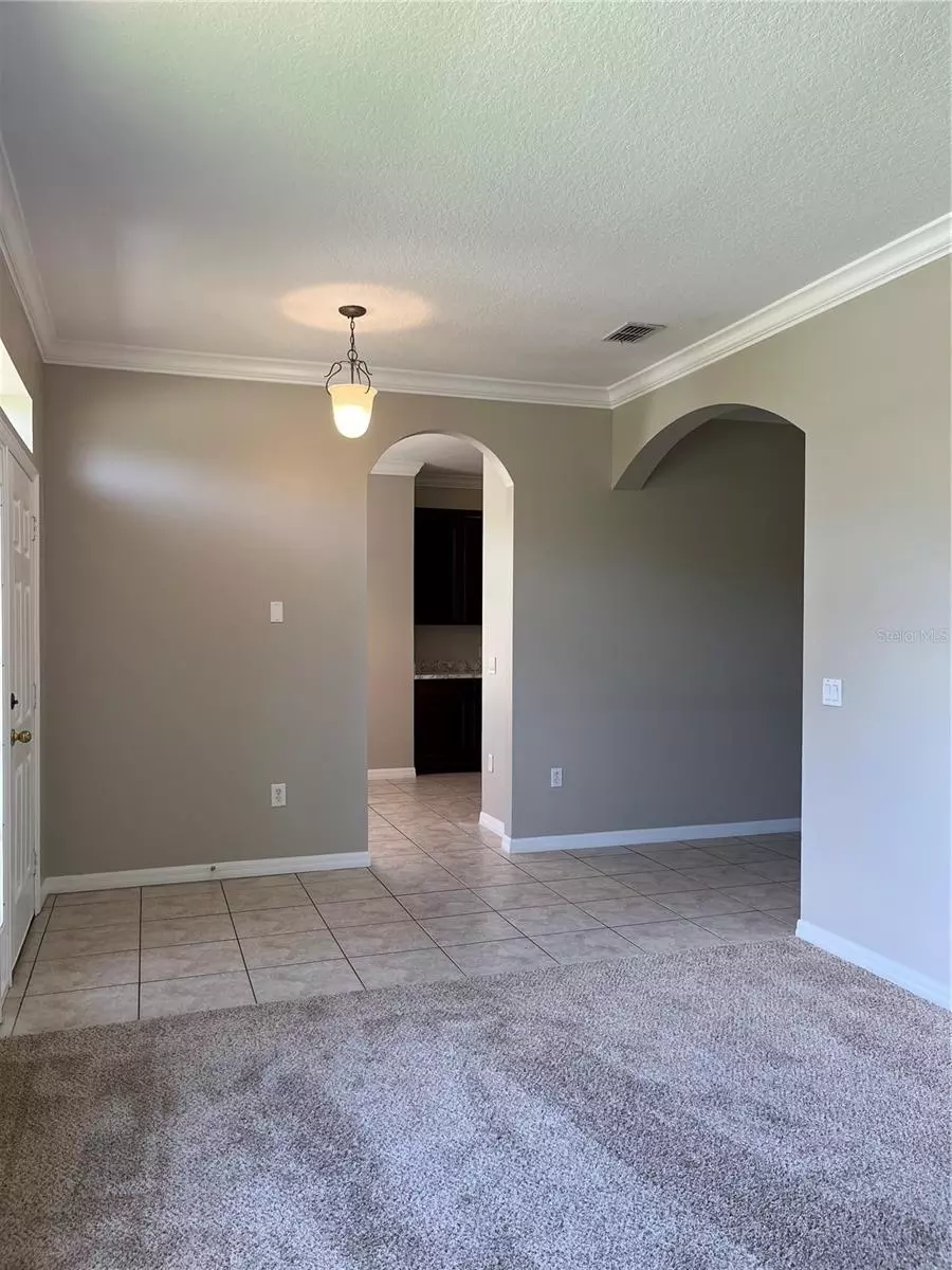 Living - 3031 Palermo Rose Way, Kissimmee, FL 34746 photo 1 of 3