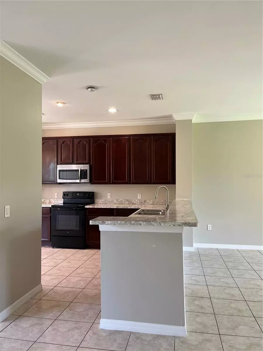 Kitchen - 3031 Palermo Rose Way, Kissimmee, FL 34746 photo 4 of 5