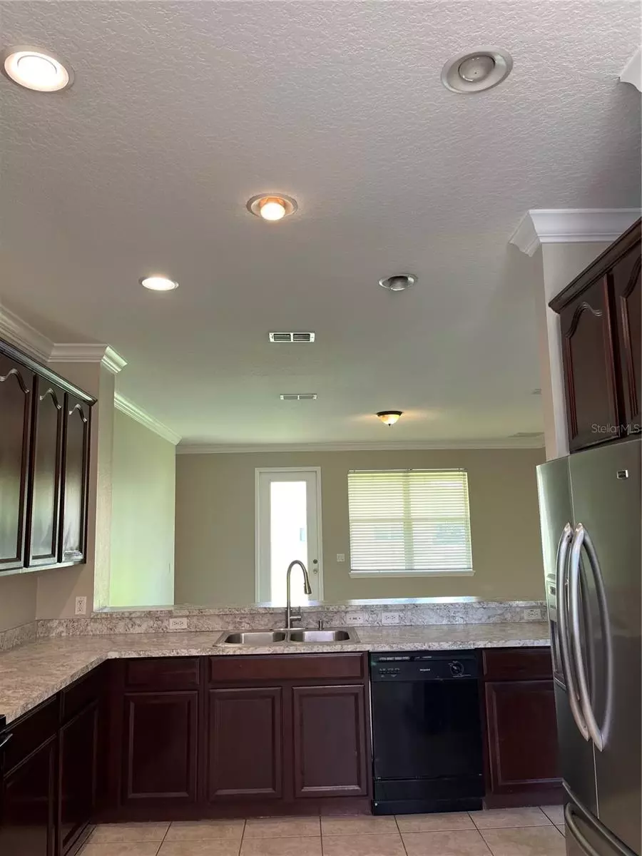 Kitchen - 3031 Palermo Rose Way, Kissimmee, FL 34746 photo 2 of 5