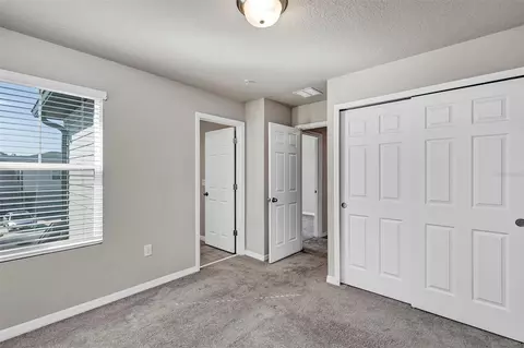 Bedroom - 1073 Desert Candle Dr, Ocoee, FL 34761 photo 8 of 13