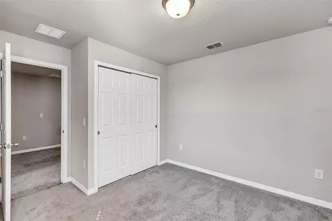 Bedroom - 1073 Desert Candle Dr, Ocoee, FL 34761 photo 9 of 13