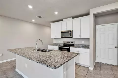 Kitchen - 1073 Desert Candle Dr, Ocoee, FL 34761 photo 2 of 4