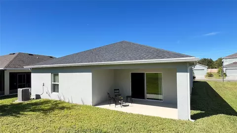 Exterior - 136 Hamlet Loop, Davenport, FL 33837 photo 5 of 8
