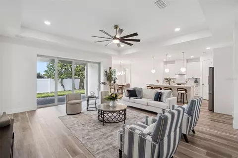 Living - 9268 Eagles Perch Pl, Orlando, FL 32825 photo 2 of 3