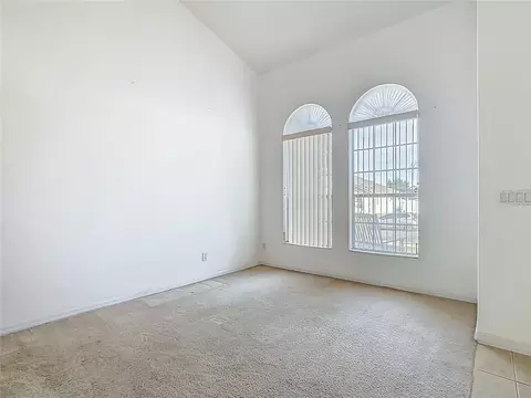 Living - 15825 Robin Hill Loop, Clermont, FL 34714 photo 7 of 10