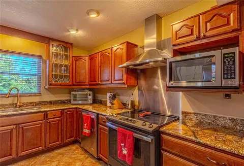 Kitchen - 4899 Sparrow Dr, Saint Cloud, FL 34772 photo 3 of 4