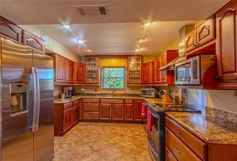 Kitchen - 4899 Sparrow Dr, Saint Cloud, FL 34772 photo 2 of 4