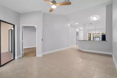 Living - 7784 Sugar Bend Dr #7784, Orlando, FL 32819 photo 3 of 4