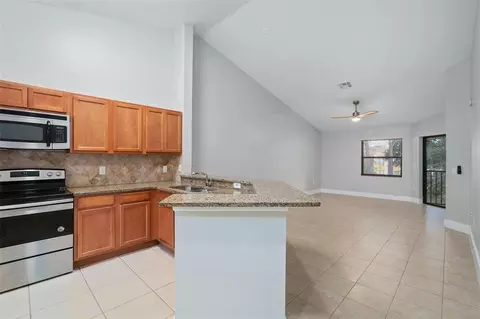 Living - 7784 Sugar Bend Dr #7784, Orlando, FL 32819 photo 1 of 4