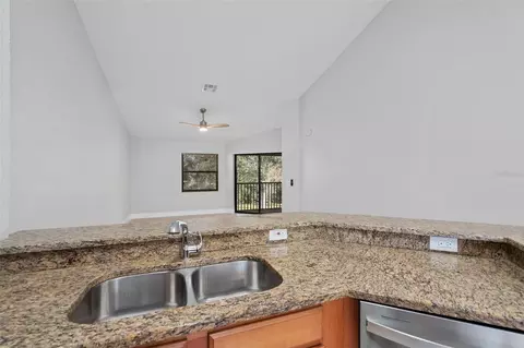 Kitchen - 7784 Sugar Bend Dr #7784, Orlando, FL 32819 photo 4 of 4