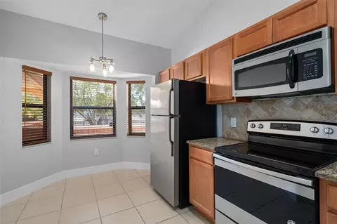 Kitchen - 7784 Sugar Bend Dr #7784, Orlando, FL 32819 photo 2 of 4