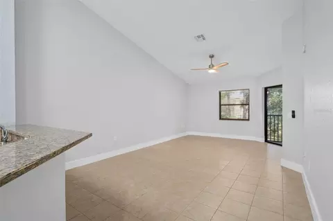 Living - 7784 Sugar Bend Dr #7784, Orlando, FL 32819 photo 2 of 4