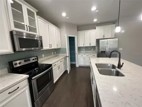 Kitchen - 3560 Pixie Ln, Saint Cloud, FL 34772 photo 2 of 2