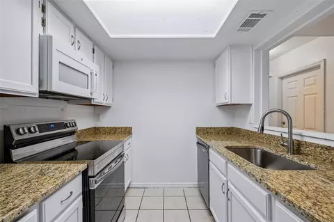 Kitchen - 5606 SW 8th Pl, Gainesville, FL 32607 photo 1 of 2