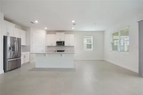 Living - 3944 Kennebunk Loop, Mount Dora, FL 32757 photo 3 of 8