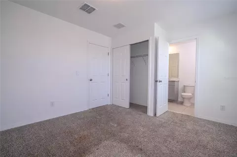 Bedroom - 4549 Burrowing Owl Loop, Saint Cloud, FL 34772 photo 2 of 10