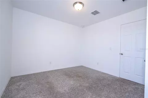 Bedroom - 4549 Burrowing Owl Loop, Saint Cloud, FL 34772 photo 3 of 10